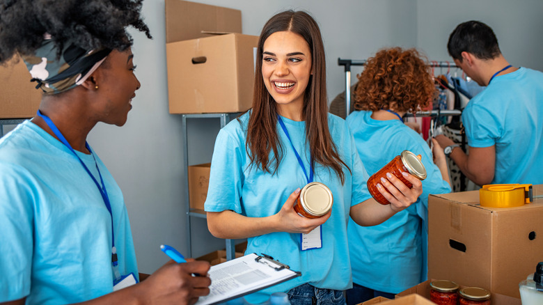 People volunteering at charity organization