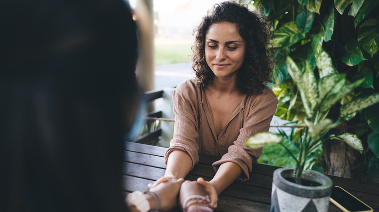 Woman patiently listening to friend