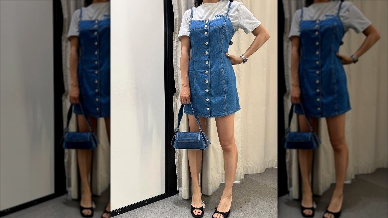 Woman in denim dress, handbag