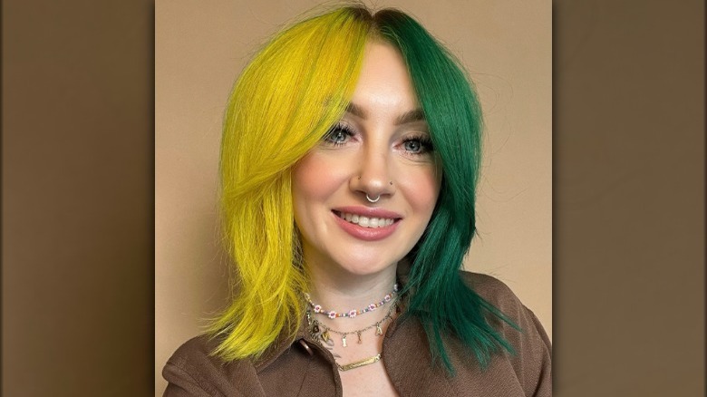 woman with yellow and green gemini hair