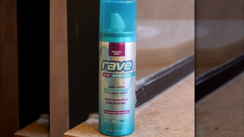 Travel size bottle of hairspray