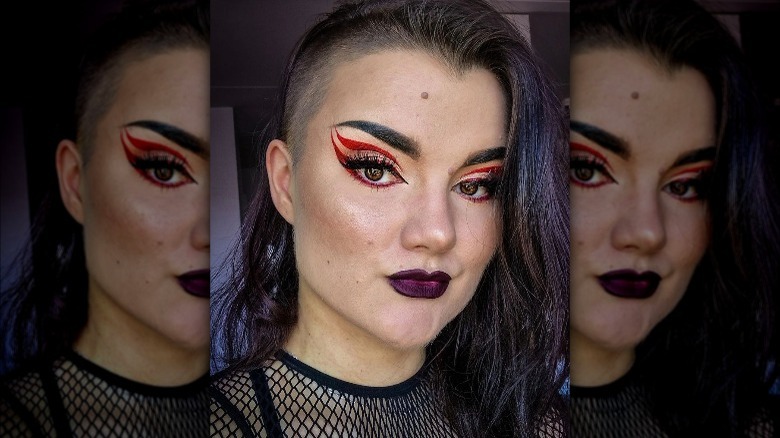 Woman with double red eyeliner