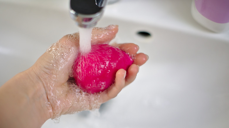 hand washing beauty blender