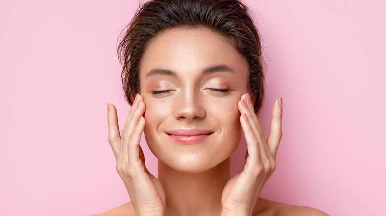 woman massaging her eyes