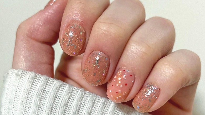 nails with tiny gingerbread men