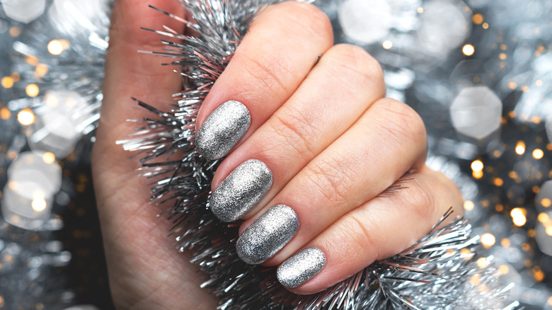 nails with silver glitter polish