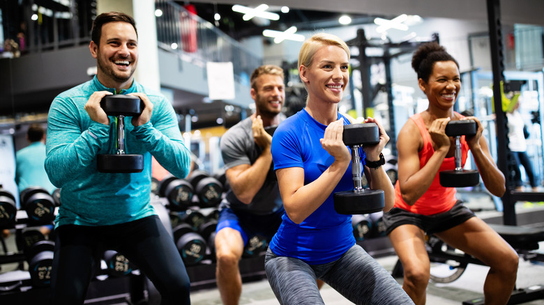 people at gym together