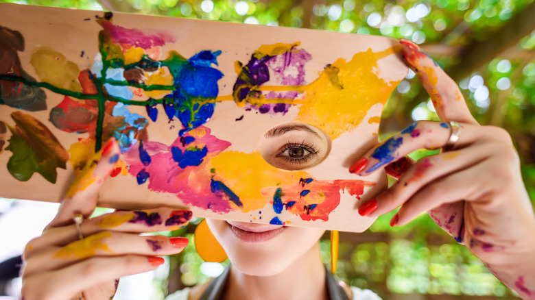 female painter with paint