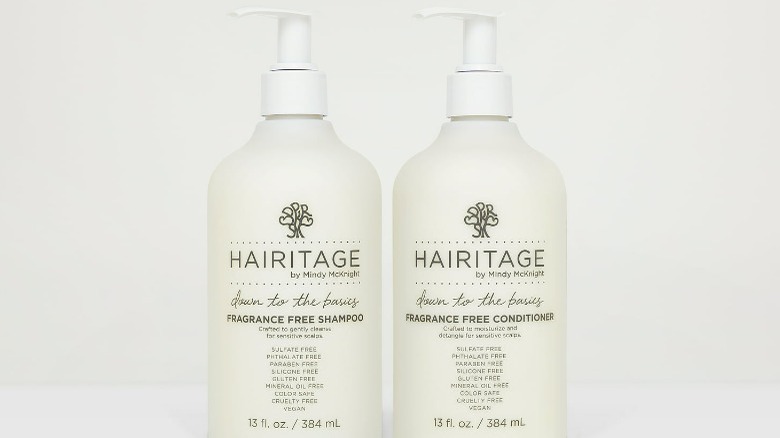 Two white hair care bottles