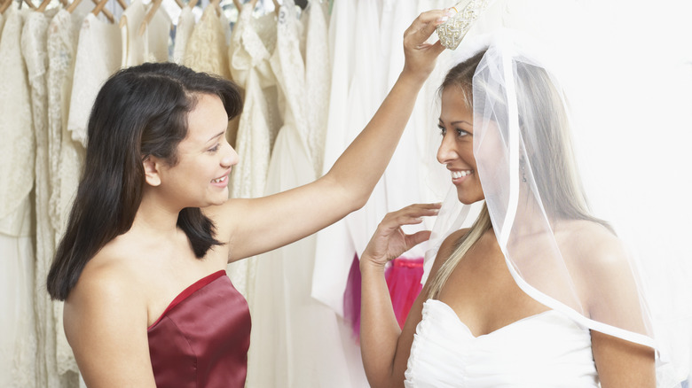 Two women wedding dress shopping
