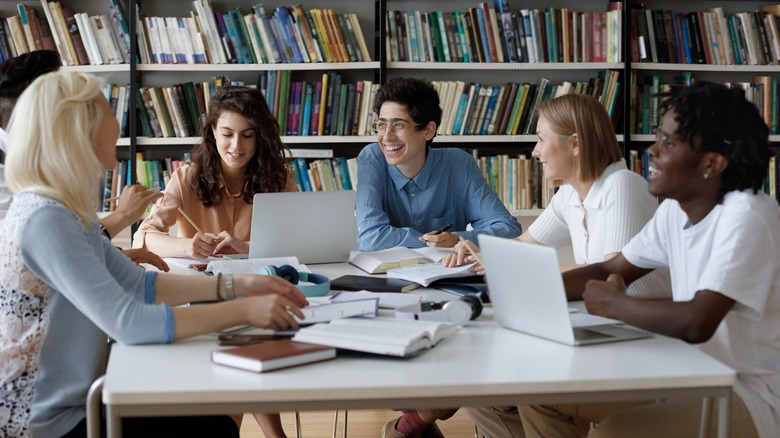 friends studying in a library