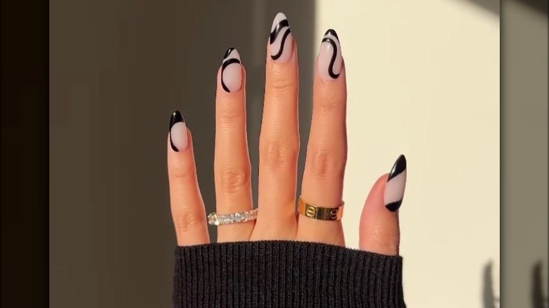 black swirl manicure 