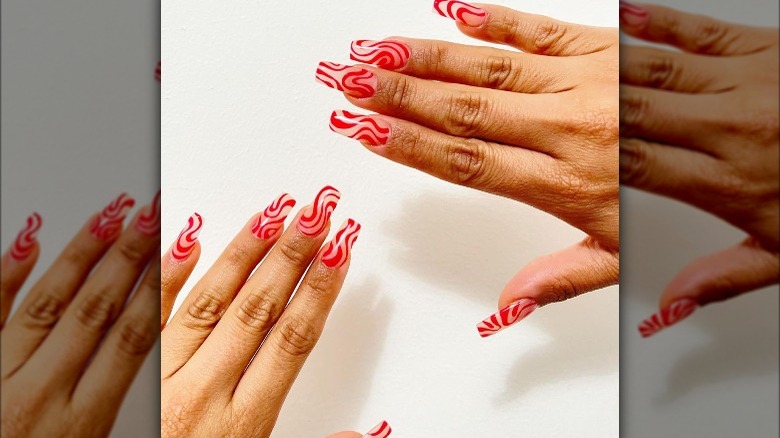 red swirl manicure