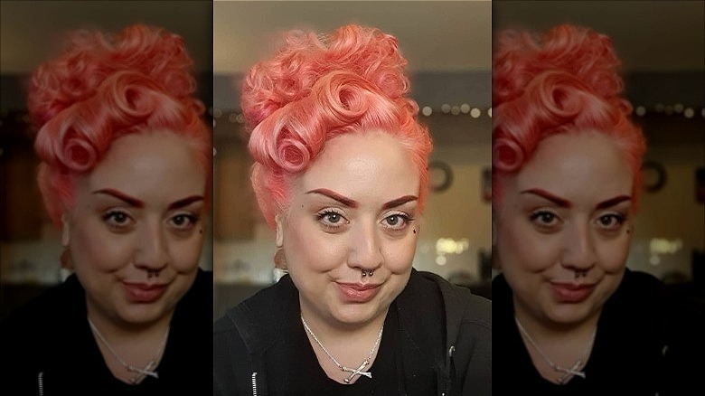 woman wearing peach pinup curls hair