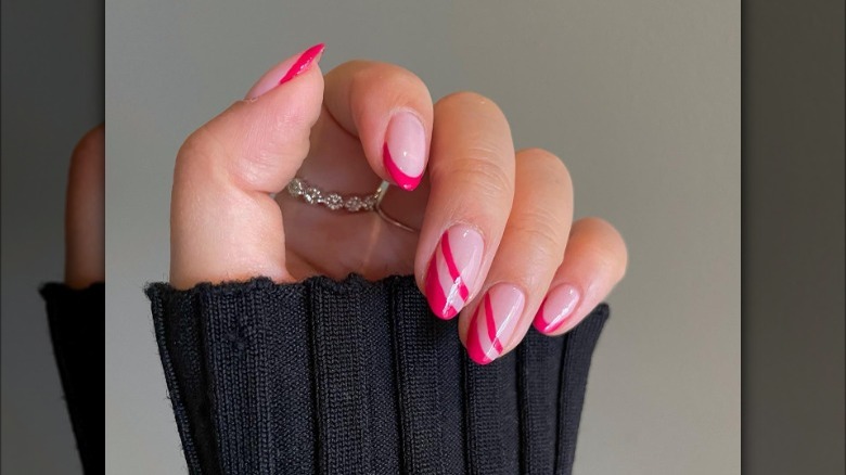 Barbie nails with pink swoops