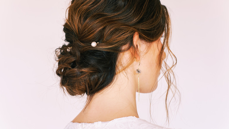 Bride with brown chignon style 