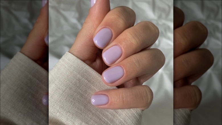 woman with lilac nails