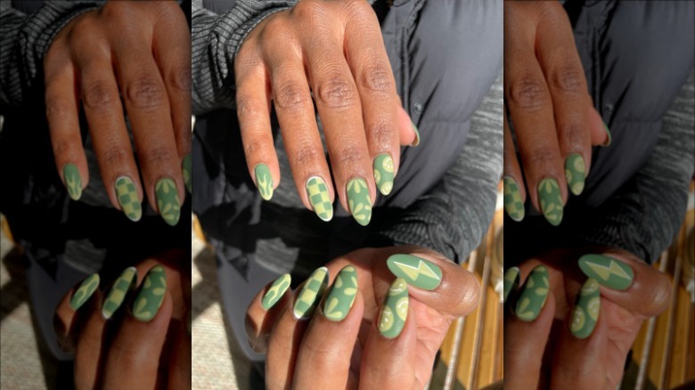 woman with matte earthy green nails