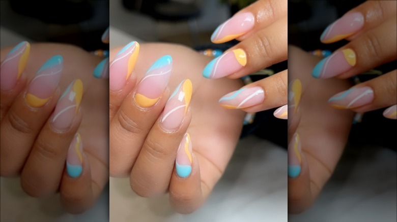 woman with pastel abstract nails