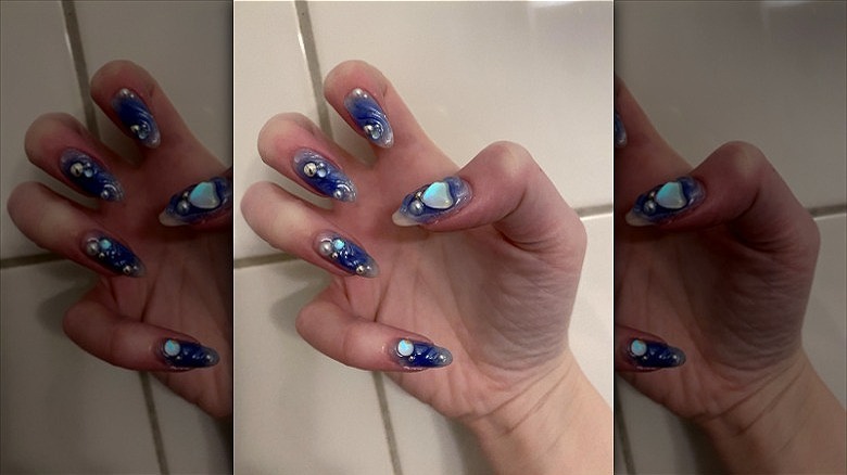 woman with 3d water nails