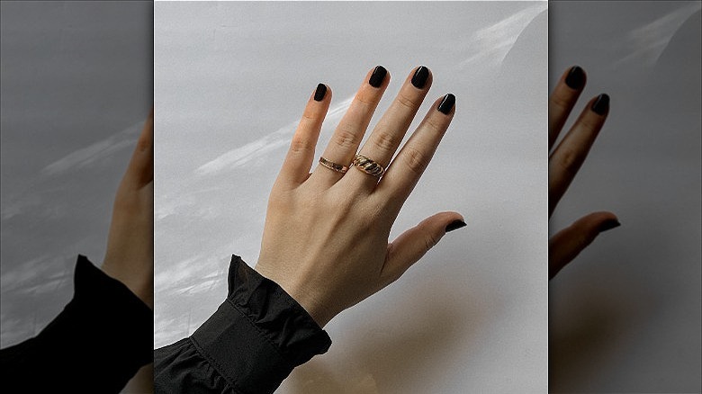 woman with black nails