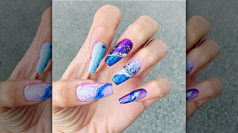 woman with mermaidcore nails