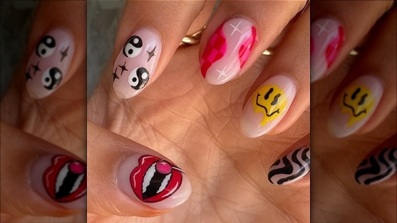 woman with smiley face nails