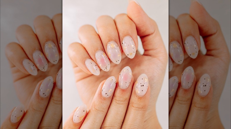 Gold flecked spotted manicure