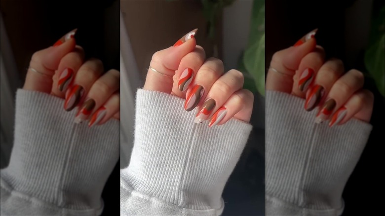 Orange and brown floral nails