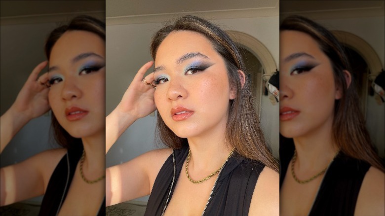 blue and black makeup look