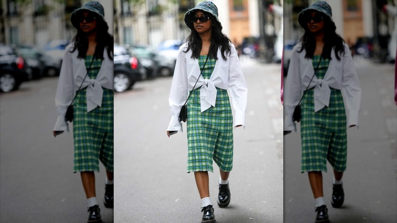 woman in plaid dress