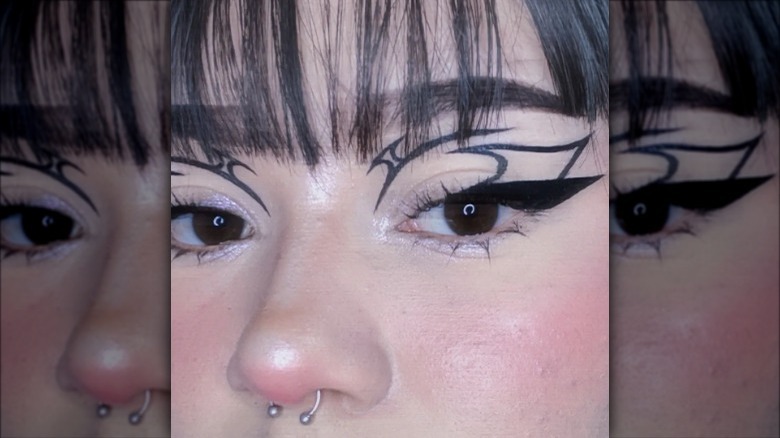 woman wearing black graphic eyeliner