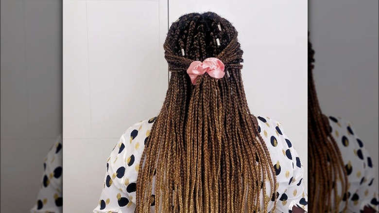 woman wearing scrunchie on braids