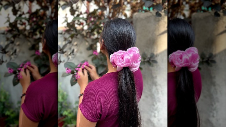 woman wearing pink scrunchie ponytail