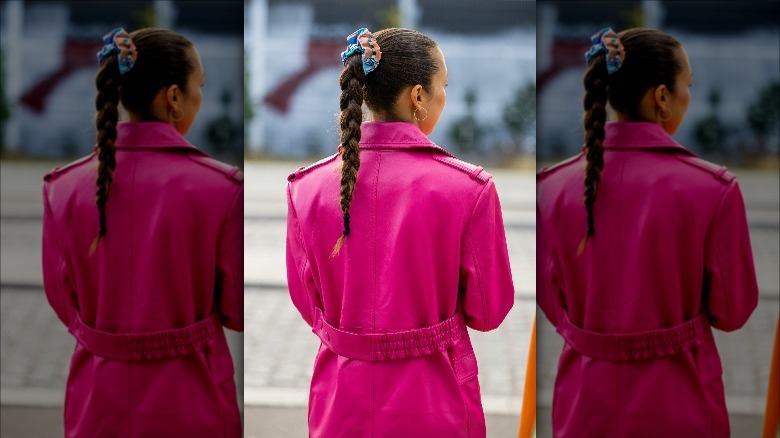 woman wearing scrunchie around braid