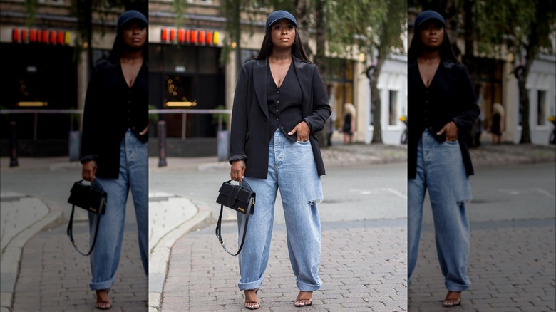 woman in waistcoat with jeans 