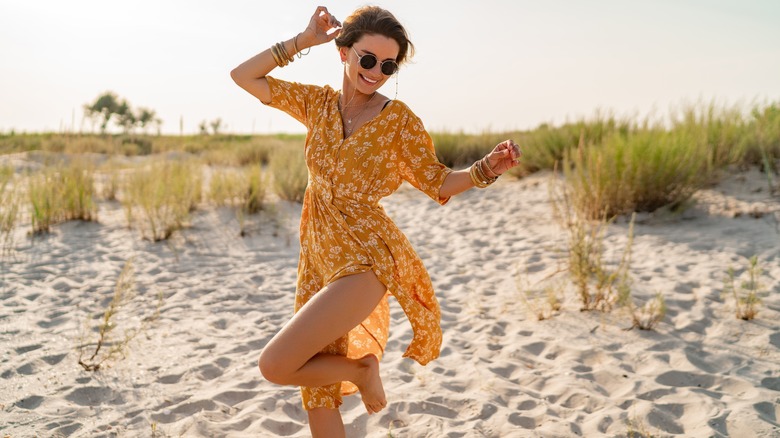 Woman dancing on the beach