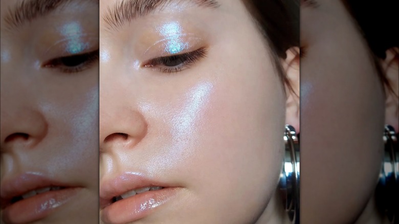 A woman with cool-toned highlighter
