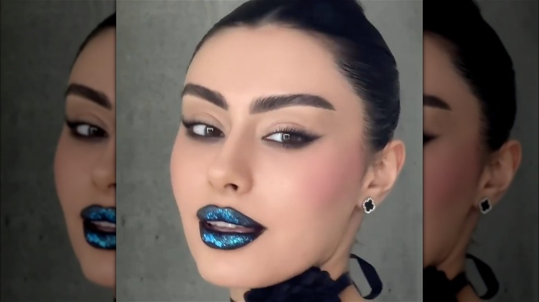 A woman with blue lips