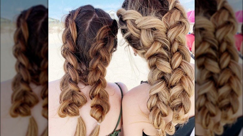 girls with braids on beach