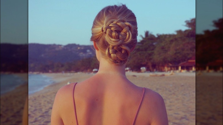 woman on beach with braids
