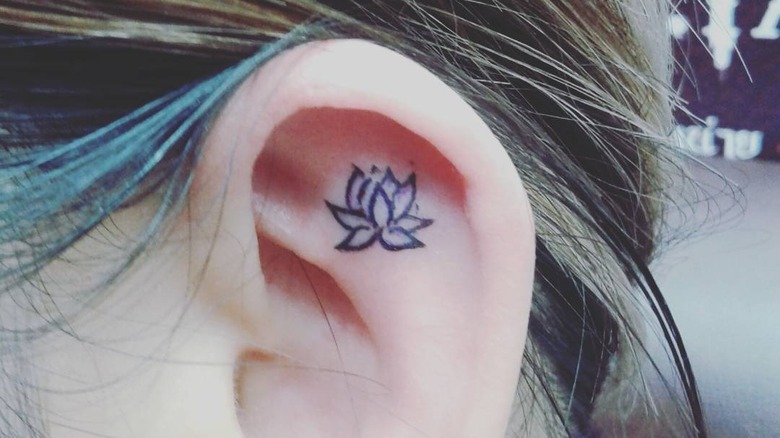 lotus ear tattoo