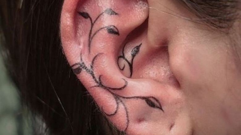 vine and leaves ear tattoo