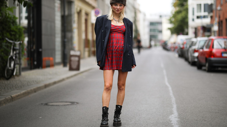 Woman wearing mini dress oversized blazer