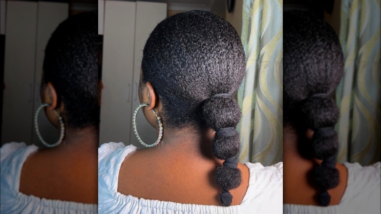 Woman with low bubble ponytail