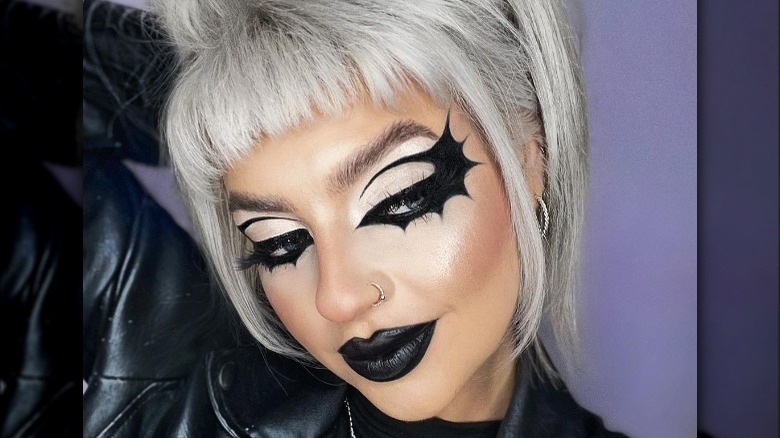 Woman wearing bat makeup