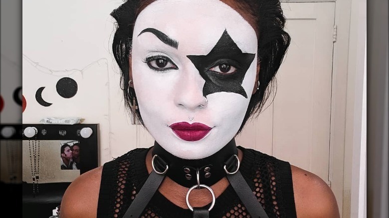 Woman wearing Starchild makeup