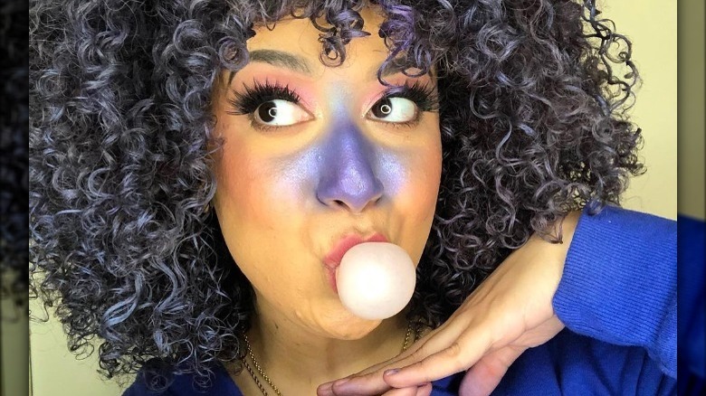 Woman wearing Violet Beauregarde makeup