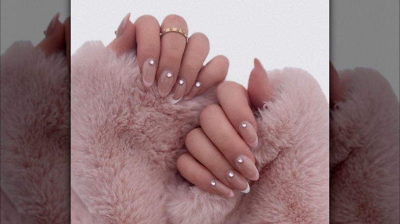 Pink coquette nails with gems