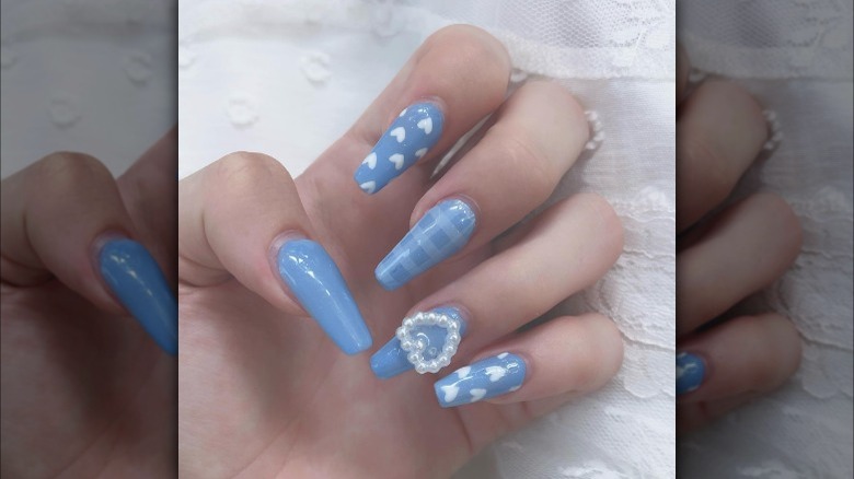 Blue coquette manicure